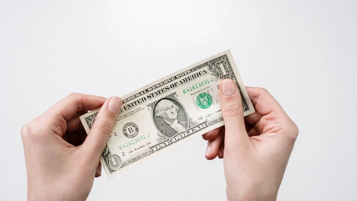 Tukar Dolar Asli vs Palsu